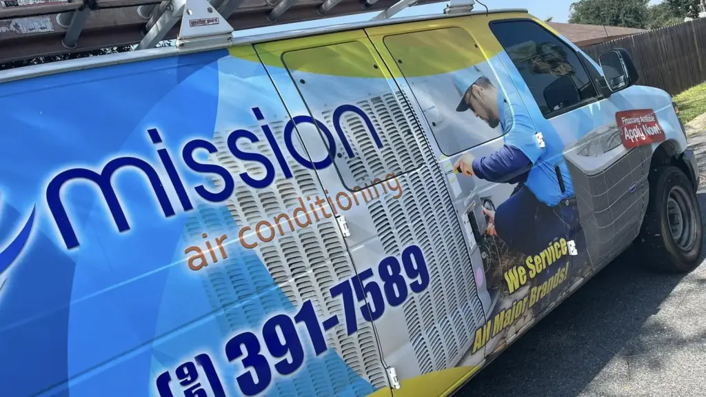 Mission Air Conditioning branded service van with logo, phone number, and financing signage